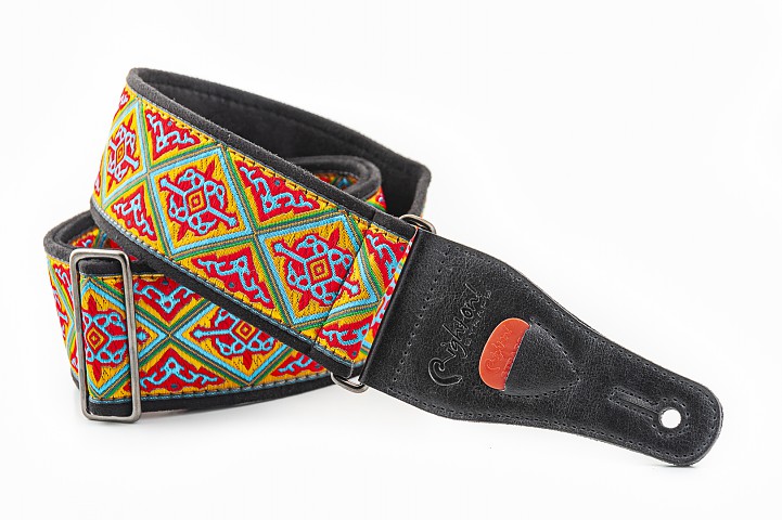 Guitar and bass strap HAFA RED model, 6 cm wide, anti-slip technical microfiber inside, 2 mm thick low density latex padding, decorated with vintage style embroidered jacquard. Inspired by the mythical Tangier cafe.